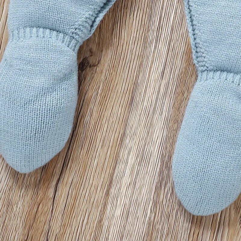 Barboteuse tricot pour nouveau-né