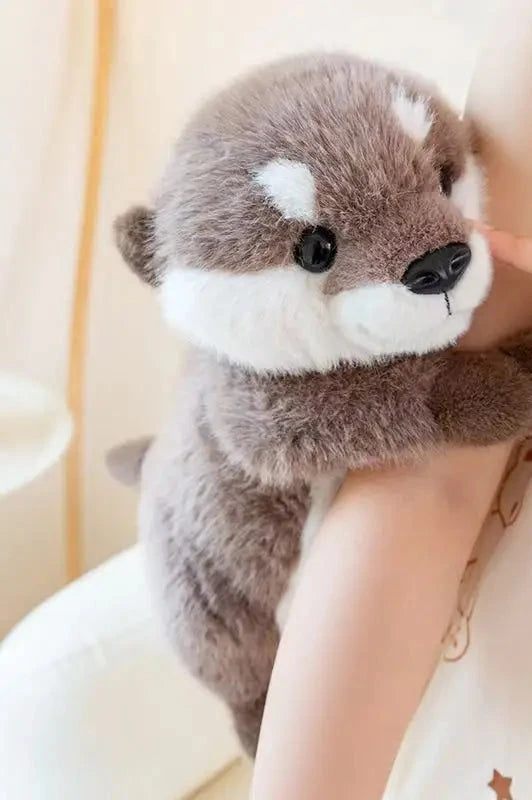 Peluche loutre